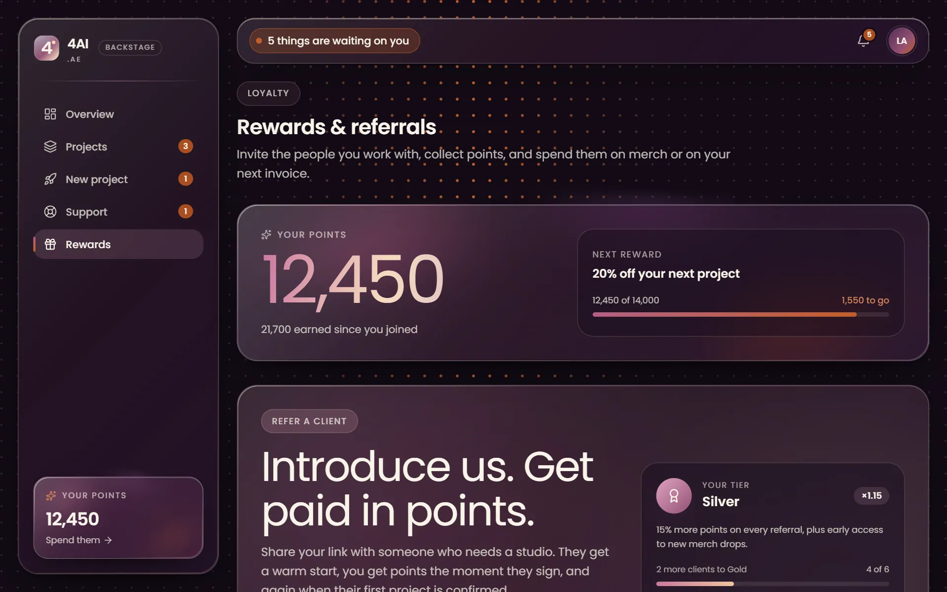 The Backstage rewards page with the points balance, the next reward and the referral panel